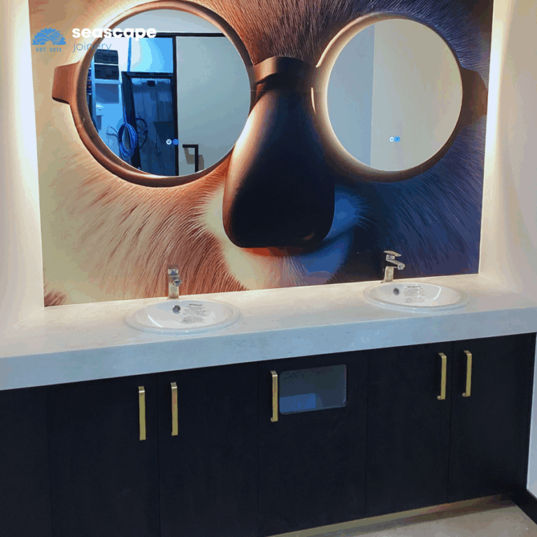 Mirror with koala image as background with cabinetry below