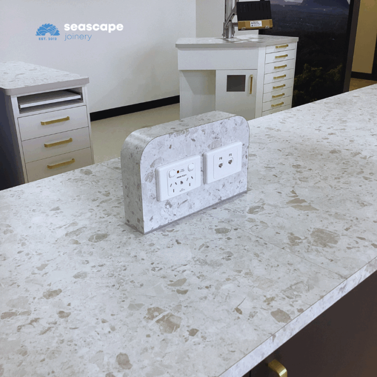 Integrated power outlets on island bench